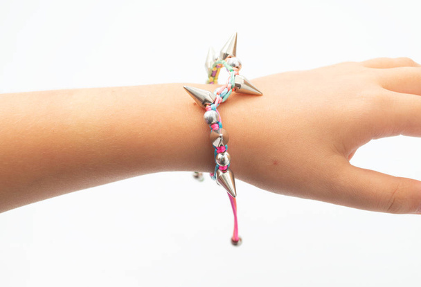 woman's arm with bracelet - Фото, изображение