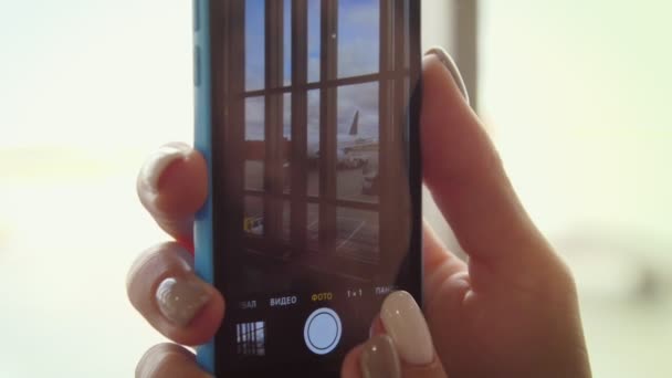 Human hands holding phone and taking photo. Making photos on smartphone - Footage, Video