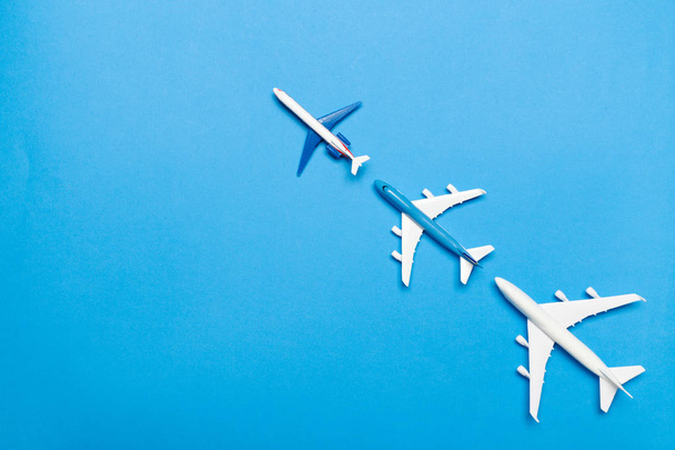 model of passenger plane on blue background - Foto, imagen