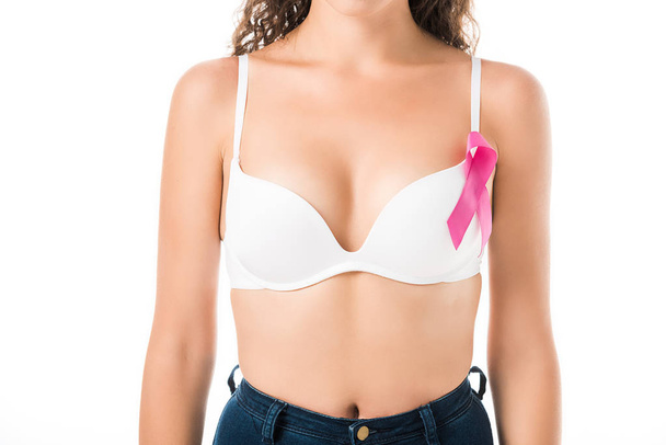 cropped shot of young woman in bra with pink ribbon, breast cancer awareness concept   - Photo, Image