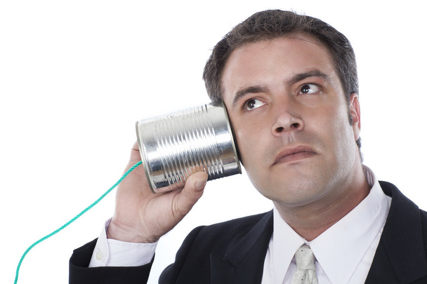 zakenman en blikje telefoon - Foto, afbeelding