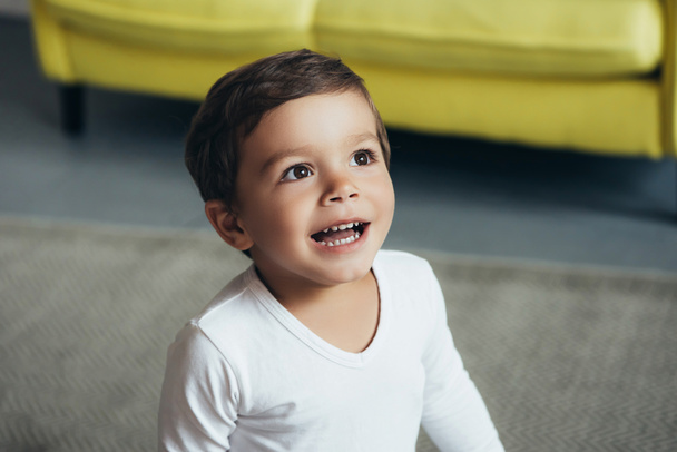 portrait of adorable excited child at home - Foto, immagini