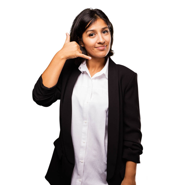 latin business woman doing telephone gesture - 写真・画像