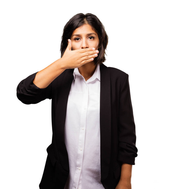 latin business woman covering her mouth - Foto, Imagen