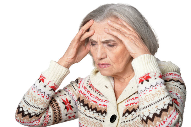 Sad senior woman with headache isolated on white background - Zdjęcie, obraz