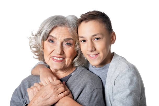 Портрет бабушки и внука на белом фоне
  - Фото, изображение