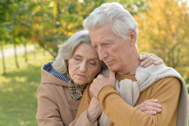 Sad senior couple in  park - Zdjęcie, obraz