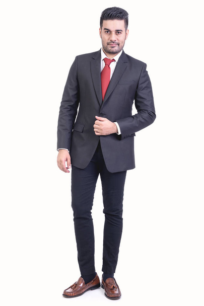Businessman isolated in white background. Handsome young indian businessman in suit portrait, confident looks. Full length shot. - Foto, afbeelding