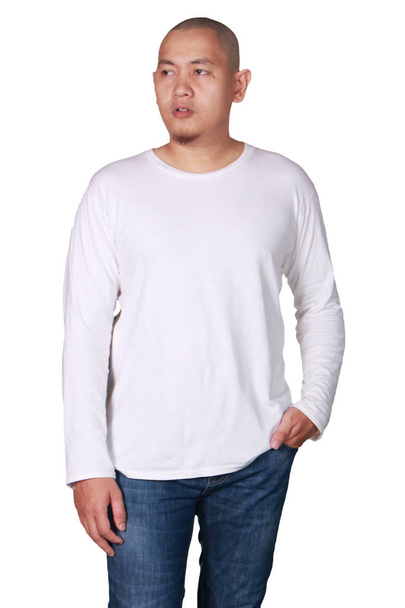 White long sleeved t-shirt mock up, front view, isolated. Male model wear plain white shirt mockup. Long sleeve shirt design template. Blank tees for print - Photo, Image