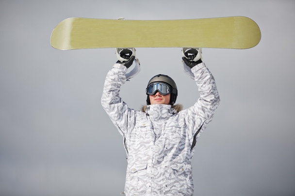 сноубордист проти сонця і неба
 - Фото, зображення