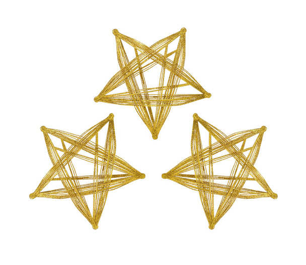 Três estrelas purpurinas douradas isoladas em fundo branco. Decoração de Natal
. - Foto, Imagem