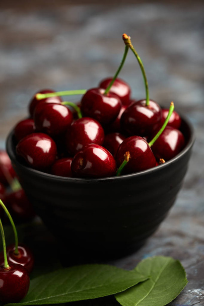 Fresh red cherry on a dark background. Cherries. Healthy food concept. - Photo, Image