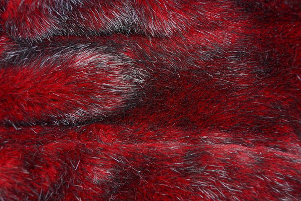 текстура червоного хутра на шматочку одягу
 - Фото, зображення