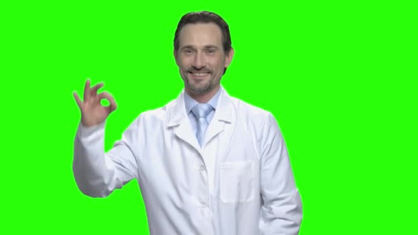 Middle aged male caucasian doctor with ok sign. - Footage, Video