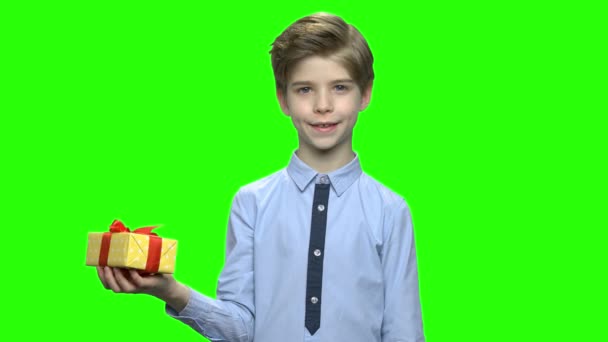Cute child boy pointing at gift box. - Footage, Video