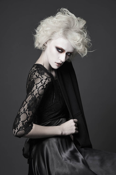 halloween style girl with white skin and hair with clown make-up.psycho woman image - Fotó, kép