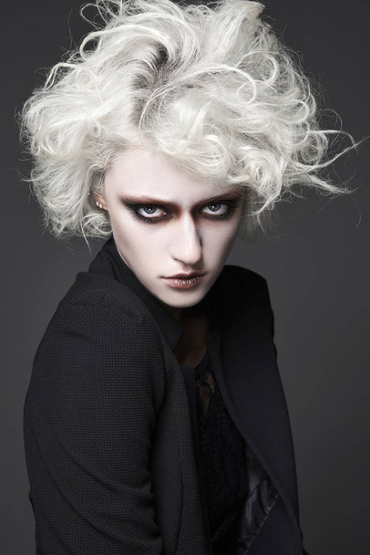 fashion close-up portrait of halloween make-up woman with white skin and hair.clown woman - Fotografie, Obrázek