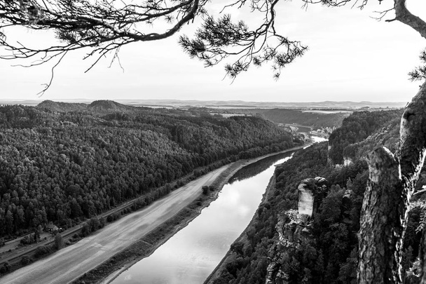Landscapes of Saxon Switzerland - is the German part of Elbe Sandstone Mountains. The valley of the river Elbe. Black and white. - Foto, Imagen