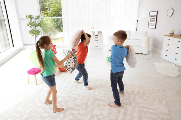 Cute little children playing together, indoors - Фото, зображення