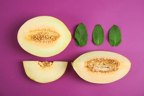 Flat lay composition with melon and mint leaves on color background - 写真・画像