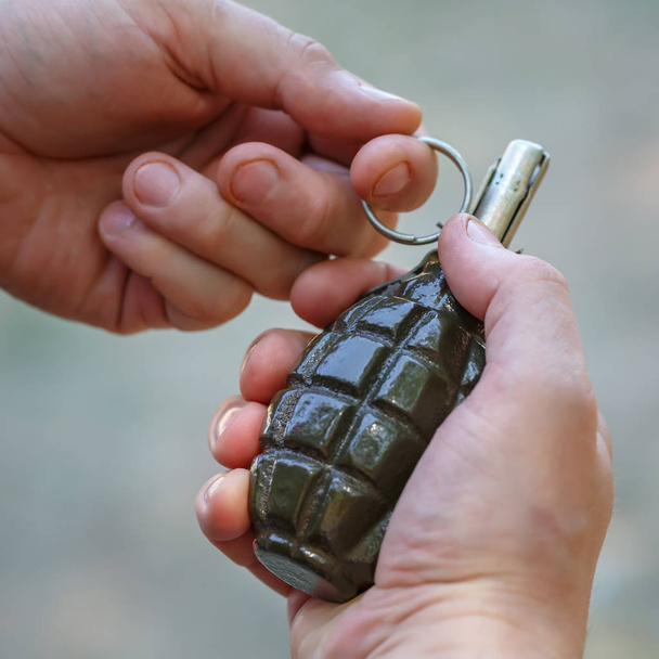 Grenade F-1 in male hands close-up - Photo, Image
