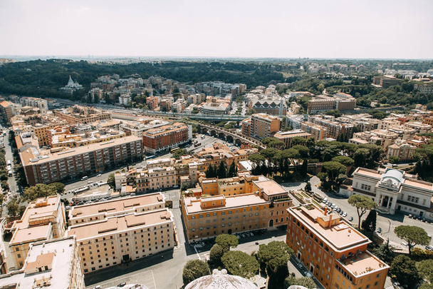 Vatican city, St. Peter's square. The view from the top and inside. Ancient architecture of Rome and the sights. Sculptures and Frescoes of great artists. Vatican Museum inside. Panoramic view from the roof - Photo, Image