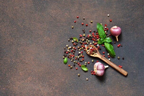 Food frame. Food background - spices: pepper, garlic, basil. Ingredients for marinade. - Фото, изображение