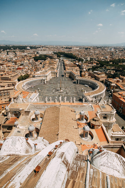 Vatican city, St. Peter's square. The view from the top and inside. Ancient architecture of Rome and the sights. Sculptures and Frescoes of great artists. Vatican Museum inside. Panoramic view from the roof - Fotografie, Obrázek