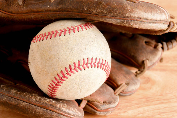 Sports Equipment old Baseball on wood background - Photo, Image