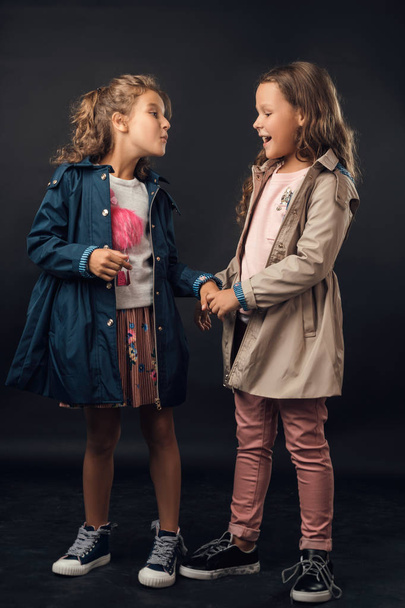 girls posing in autumn clothes in the Studio - Фото, изображение