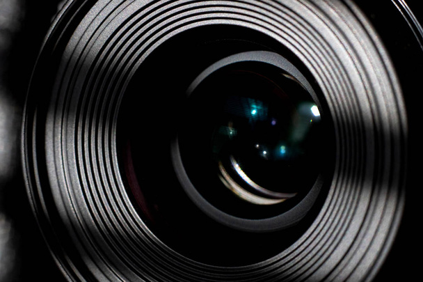 Camera lens close up in the dark - Photo, Image