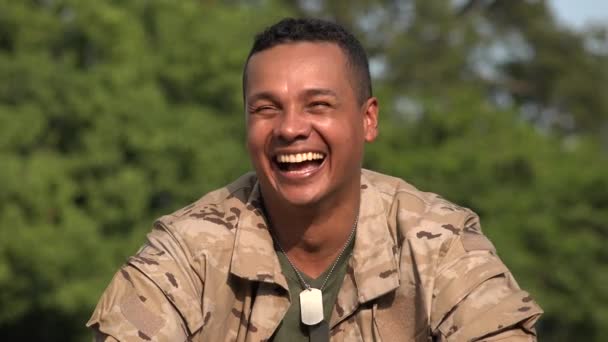 Happy Hispanic Male Soldier Wearing Camo - Metraje, vídeo