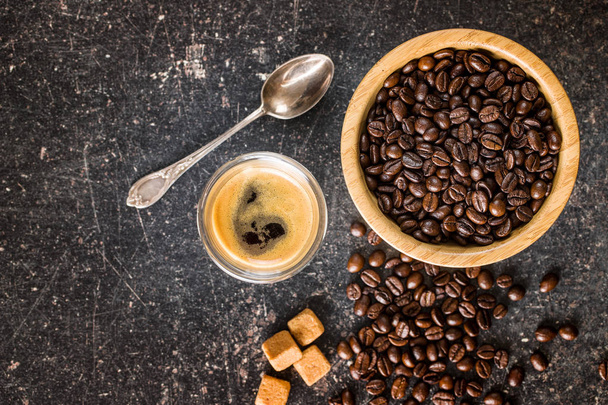 Coffee beans and espresso coffee. Top view. - Fotografie, Obrázek