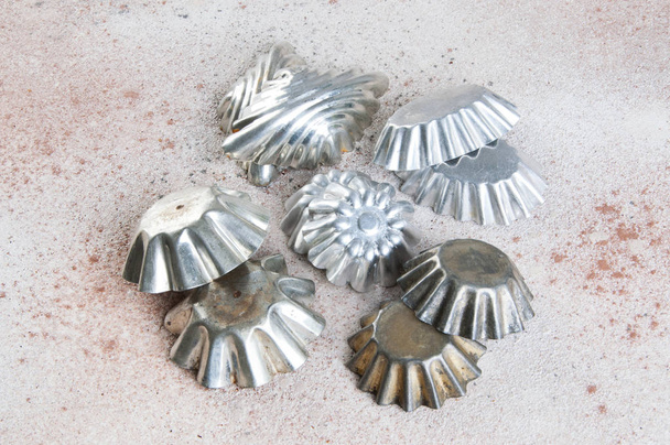 Vintage metal cookie molds on a concrete background. Copy space for text - Photo, Image