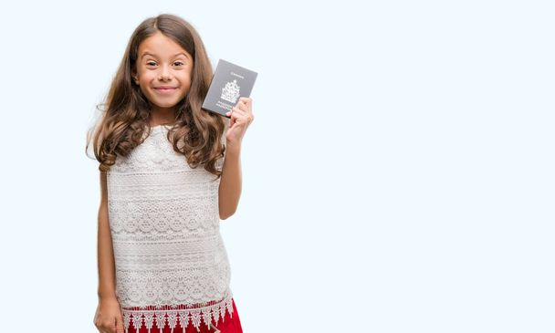 Brunette hispanic girl holding passport of Canada with a happy face standing and smiling with a confident smile showing teeth - Foto, afbeelding