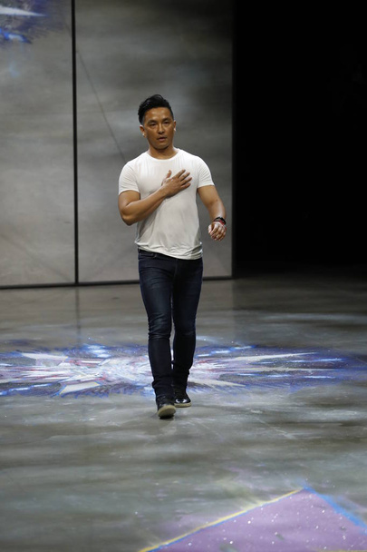 NEW YORK, NY - FEBRUARY 11: Prabal Gurung greets the audiance after presenting his Prabal Gurung Fall 2018 Collection at Gallery I at Spring Studios on February 11, 2018 in New York City. - Фото, изображение