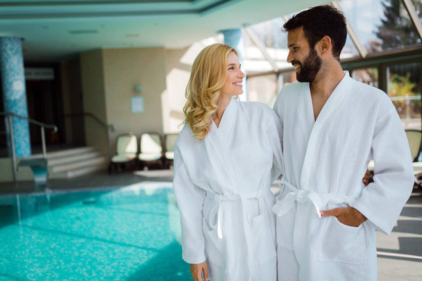 Portrait of attractive couple enjoying in spa center - Photo, image