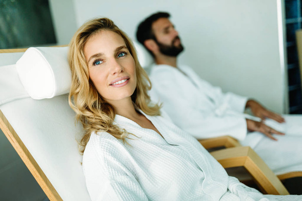 Portrait of beautiful happy woman relaxing in spa center - Zdjęcie, obraz