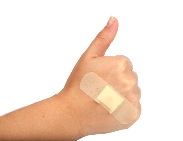 gesso médico ou sistema transdérmico na mão isolado no branco
 - Foto, Imagem