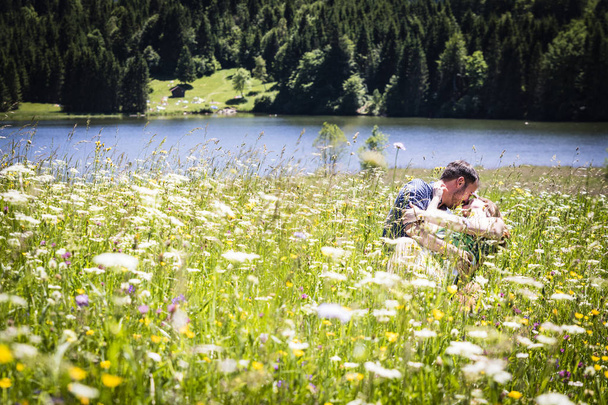 Two happy lovers on Holiday in the alps mountains - Photo, Image