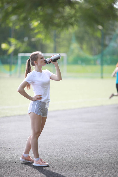 Girl and sport lifestyle doing exercises - Fotó, kép
