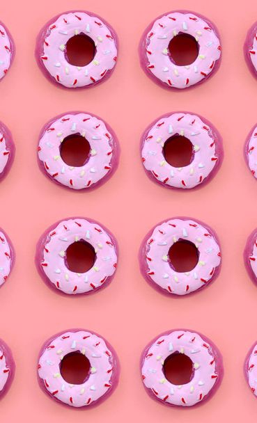 Many small plastic donuts lies on a pastel colorful background. Flat lay minimal pattern. Top view - Foto, Imagen