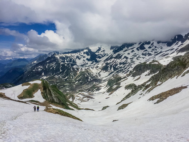 tourists hiking in beautiful Alps mountain - Fotografie, Obrázek