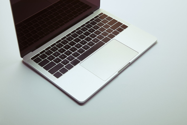laptop with blank screen on white tabletop - Φωτογραφία, εικόνα