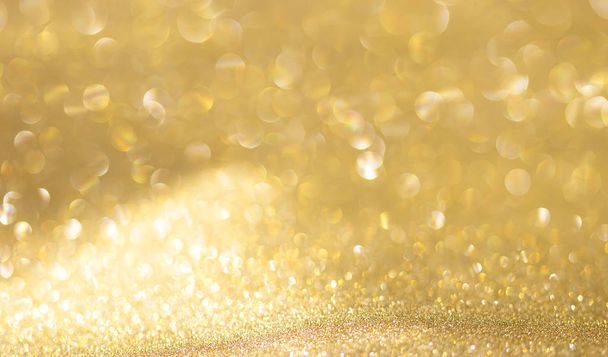 Gouden bokeh achtergrond abstracte achtergrond glitter schittering - Foto, afbeelding
