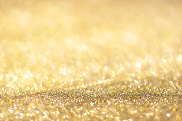 Golden bokeh background Abstract background glitter glare - 写真・画像