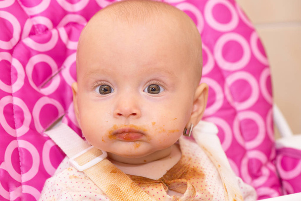 Baby dirty at his mouth after eating - Photo, image