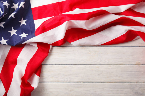 American flag close up on wood desk. Memorial day - Foto, imagen