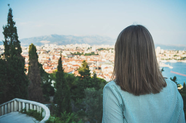 Woman enjoying views of the old town of Split. - Fotografie, Obrázek