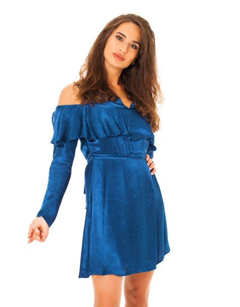 Beautiful brunette woman in blue dress, studio isolated on white background - Zdjęcie, obraz